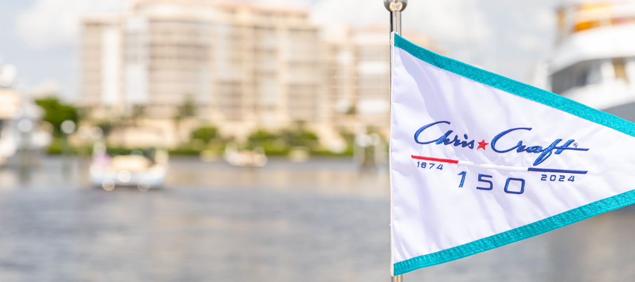 150th Anniversary Flag on the water