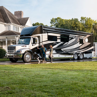Newmar RV in front of white house