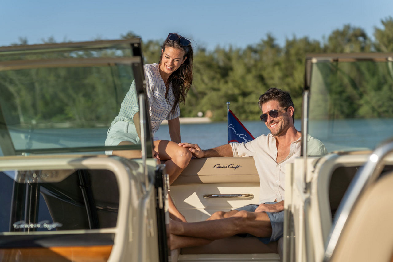 Couple sitting in the bow of the Calypso 28