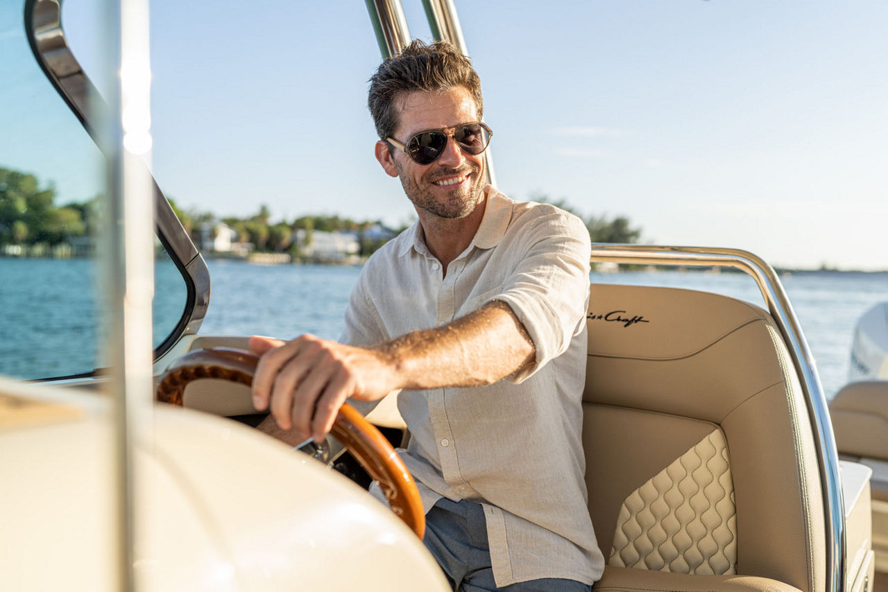 Man sitting at the help of the Calypso 28