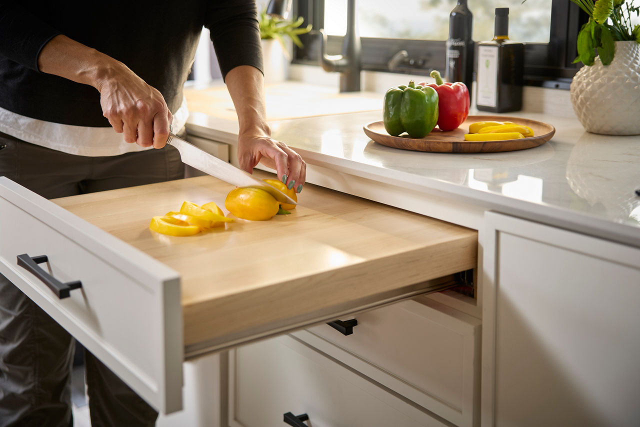 Woman using cutting board in Freedom Aire