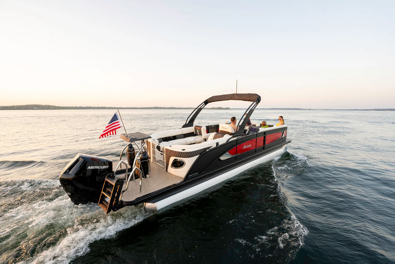 Lusso pontoon boat on the water