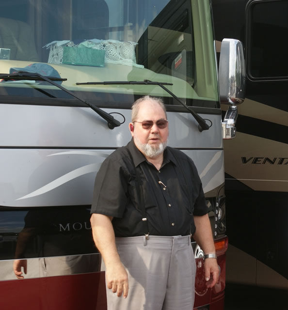 Mahlon Miller standing in front of a Newmar Mountain Star RV