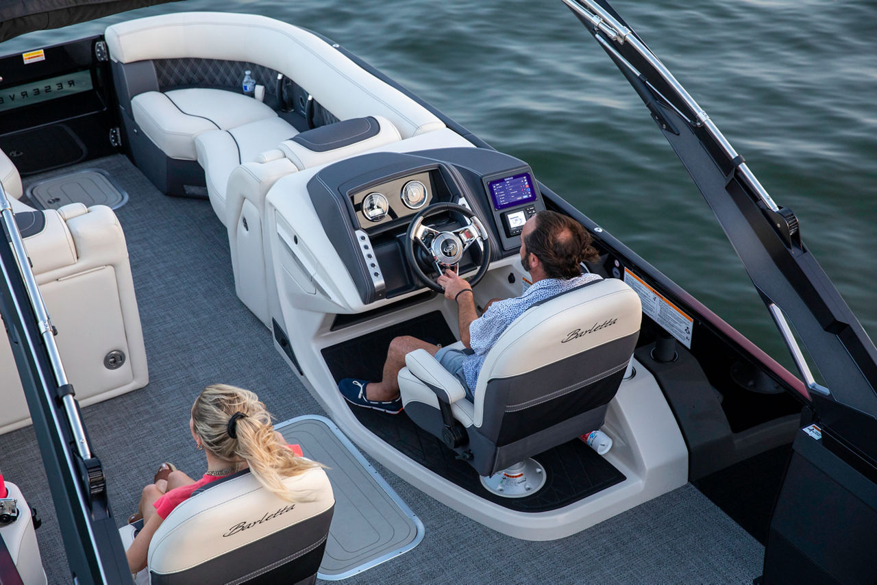 image of person driving a boat