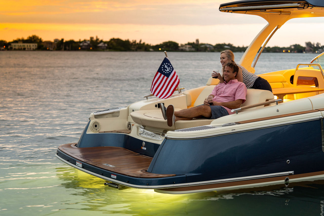 image of people relaxing on backof boat