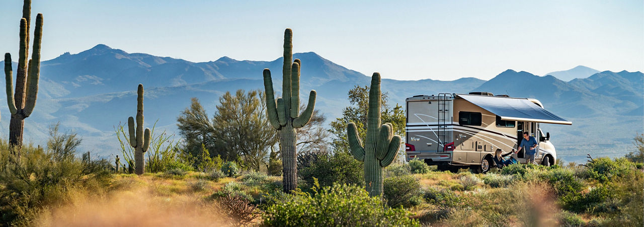 image of winnebago in the desert