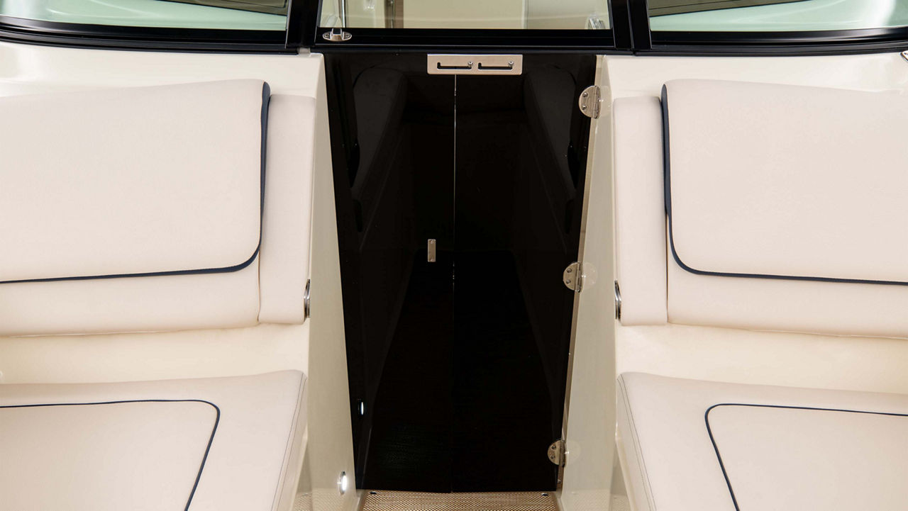 calypso 24 gallery interior 13 hinged wind door that folds to deck in bow area