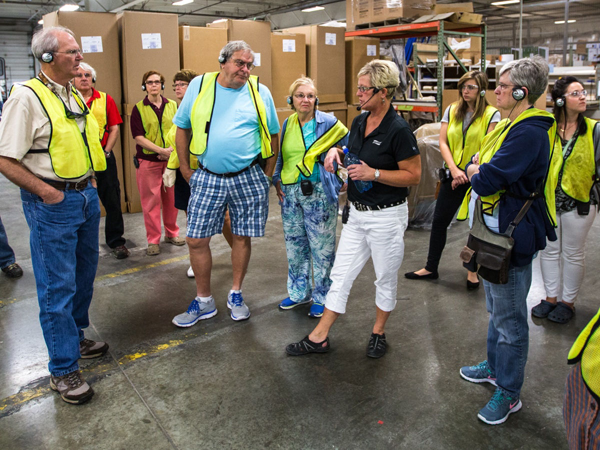 people attending a factory tour
