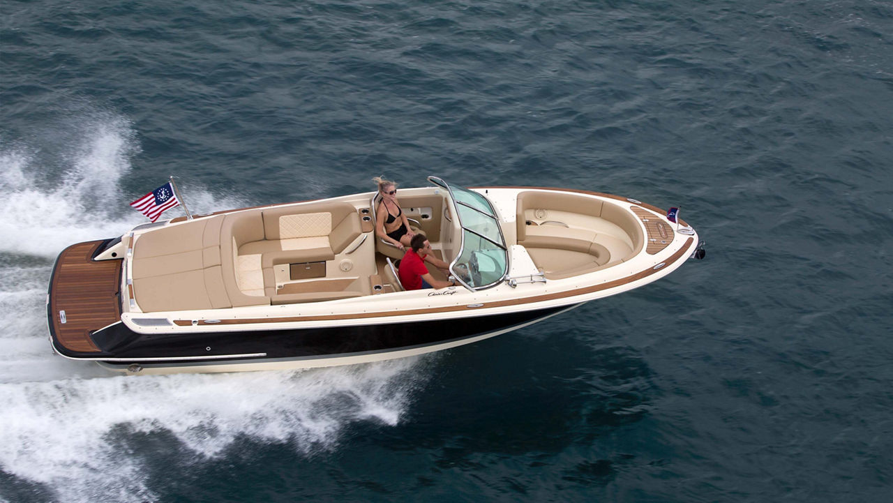 Op top view on chris craft boat on the water