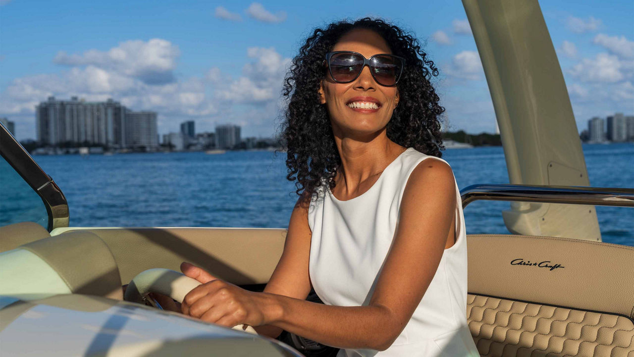 Lady smiling on a boat