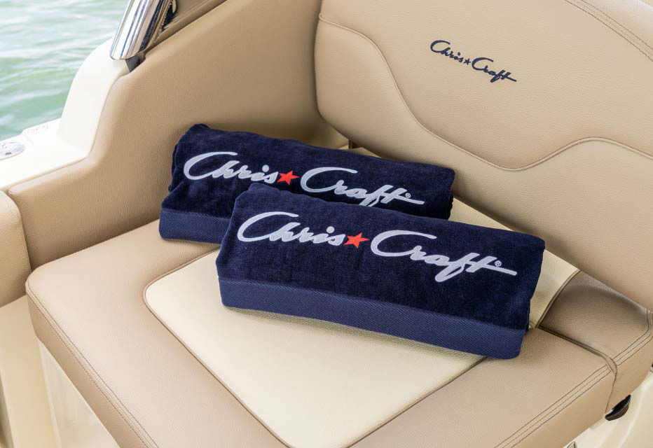 Two chris craft pillows on a chris craft seat